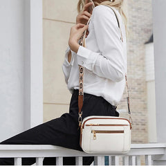 Damska torba na ramię ze wzorem i szerokimi paskami