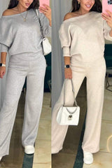 Damski komplet z asymetrycznym topem i spodniami casualowymi