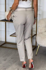Spodnie damskie casualowe o nieregularnym kroju (z paskiem)