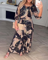 Elegancka szyfonowa sukienka z nadrukiem na trzy czwarte rękawa