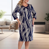 Elegancka damska sukienka z abstrakcyjnym nadrukiem i rękawami 3/4