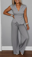 Damski garnitur casualowy z dekoltem w serek i guzikami w jednolitym kolorze w pasie