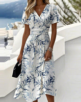 Elegancka sukienka z nadrukiem botanicznym