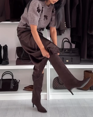 Damski sweter z okrągłym dekoltem i ozdobną kokardką