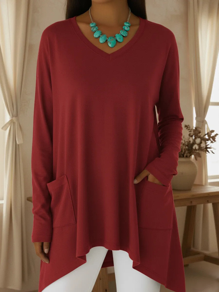 Damski luźny sweter z dekoltem w serek i nieregularnym dołem