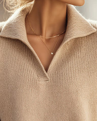 Elegancki i wszechstronny sweter z dekoltem w serek