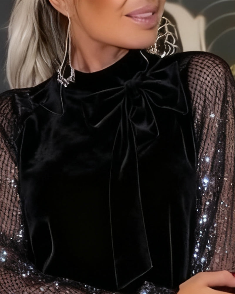 Elegancka sukienka z rękawami typu latarnia i patchworkiem