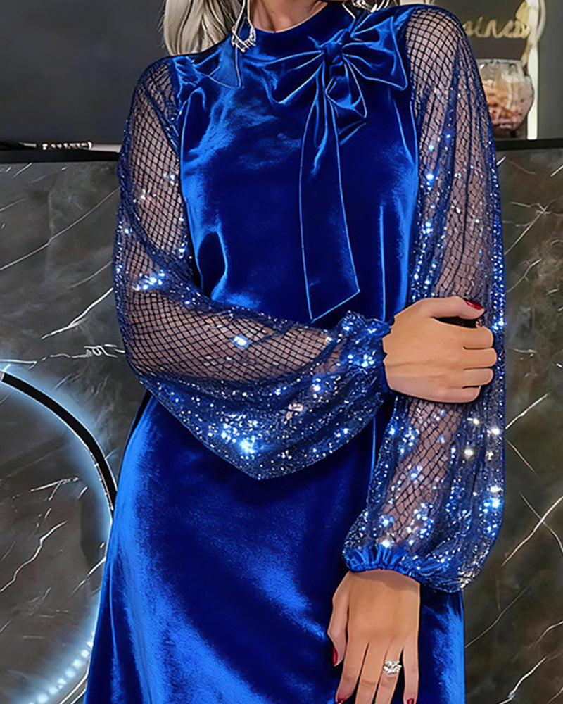 Elegancka sukienka z rękawami typu latarnia i patchworkiem