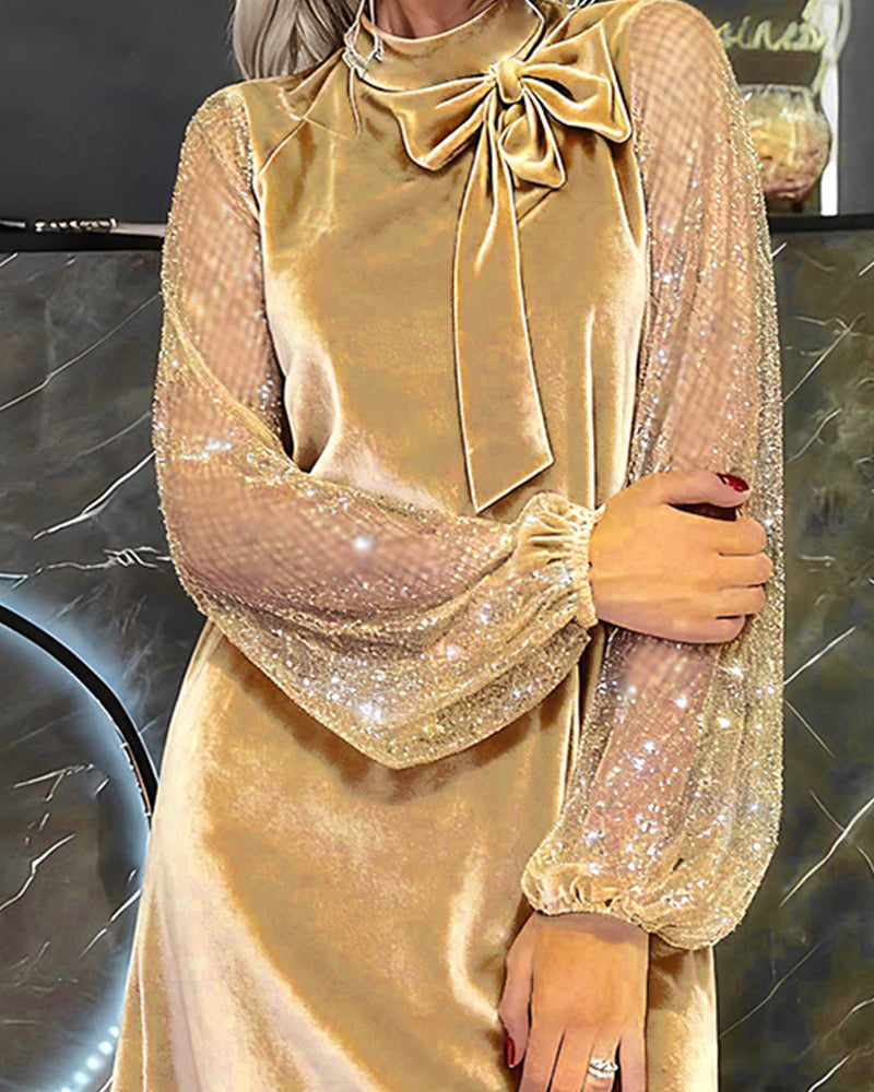 Elegancka sukienka z rękawami typu latarnia i patchworkiem