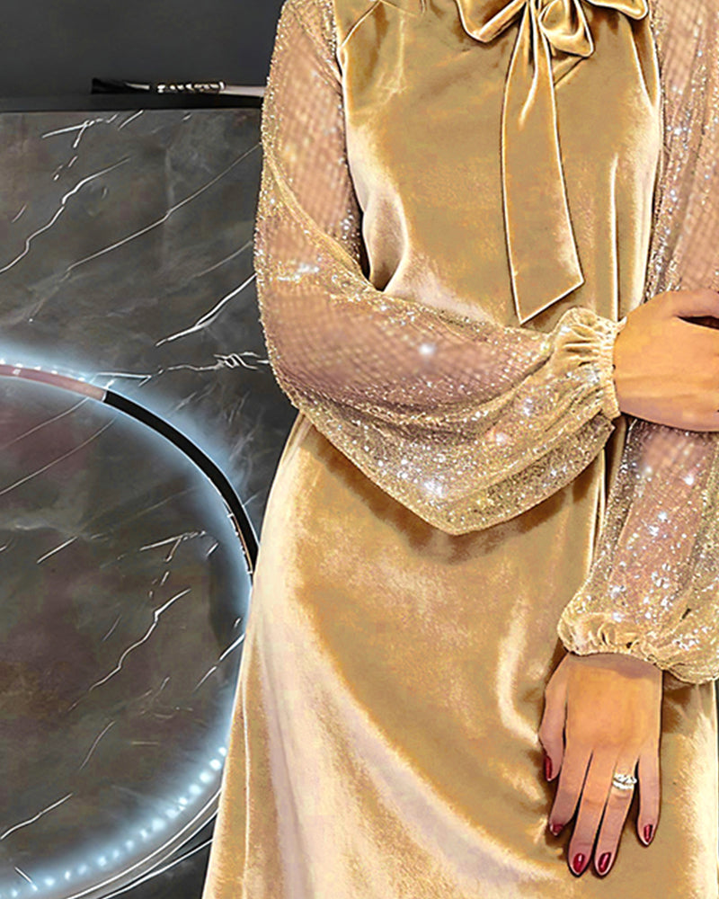 Elegancka sukienka z rękawami typu latarnia i patchworkiem