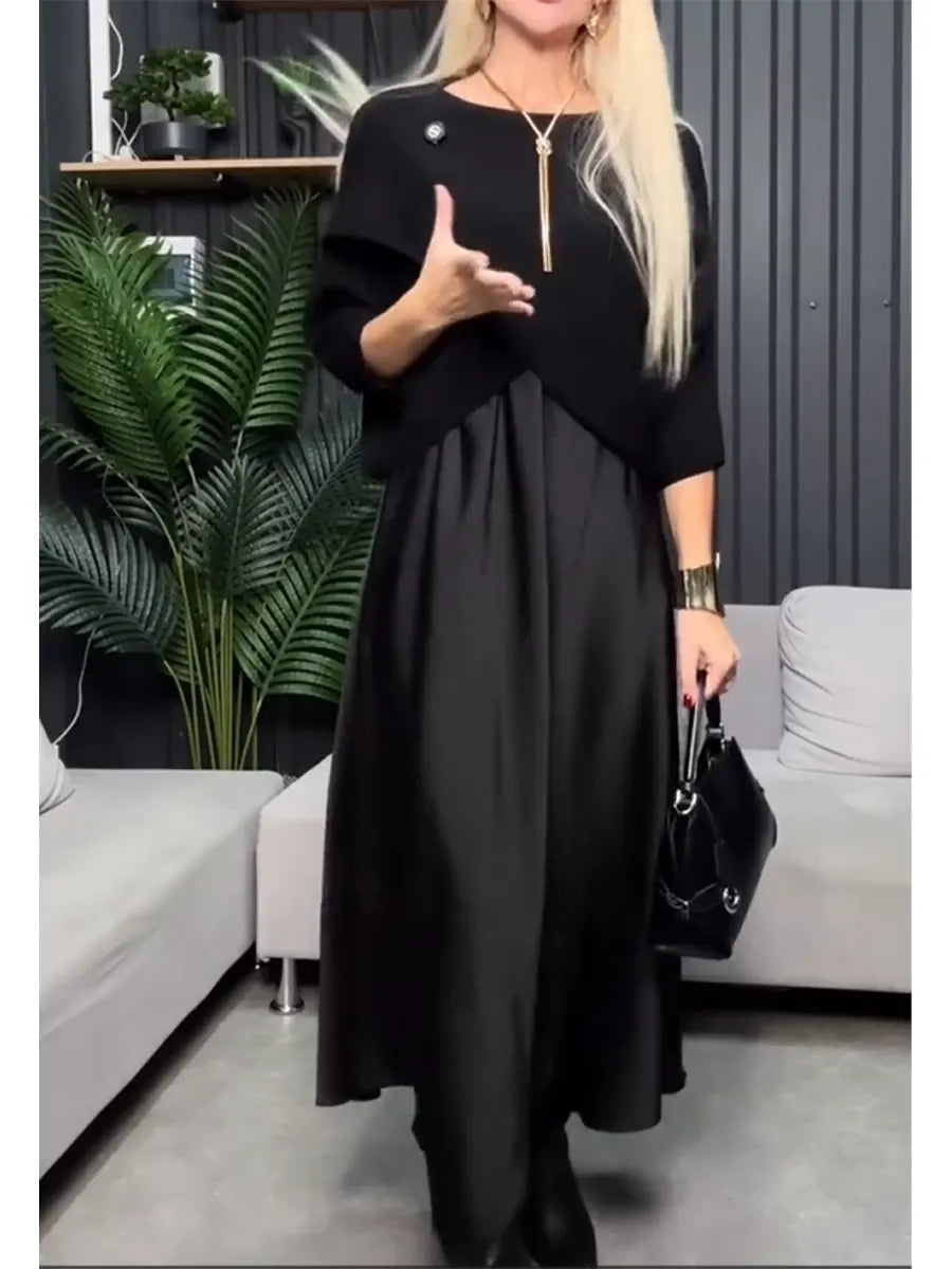 Dwuczęściowy komplet damski składający się z dzianinowego swetra i satynowej sukienki