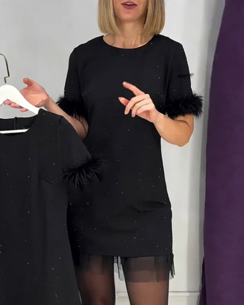 Elegancka damska sukienka z tiulu ze strasami