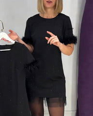 Elegancka damska sukienka z tiulu ze strasami