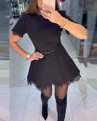 Elegancka, błyszcząca koronkowa sukienka damska