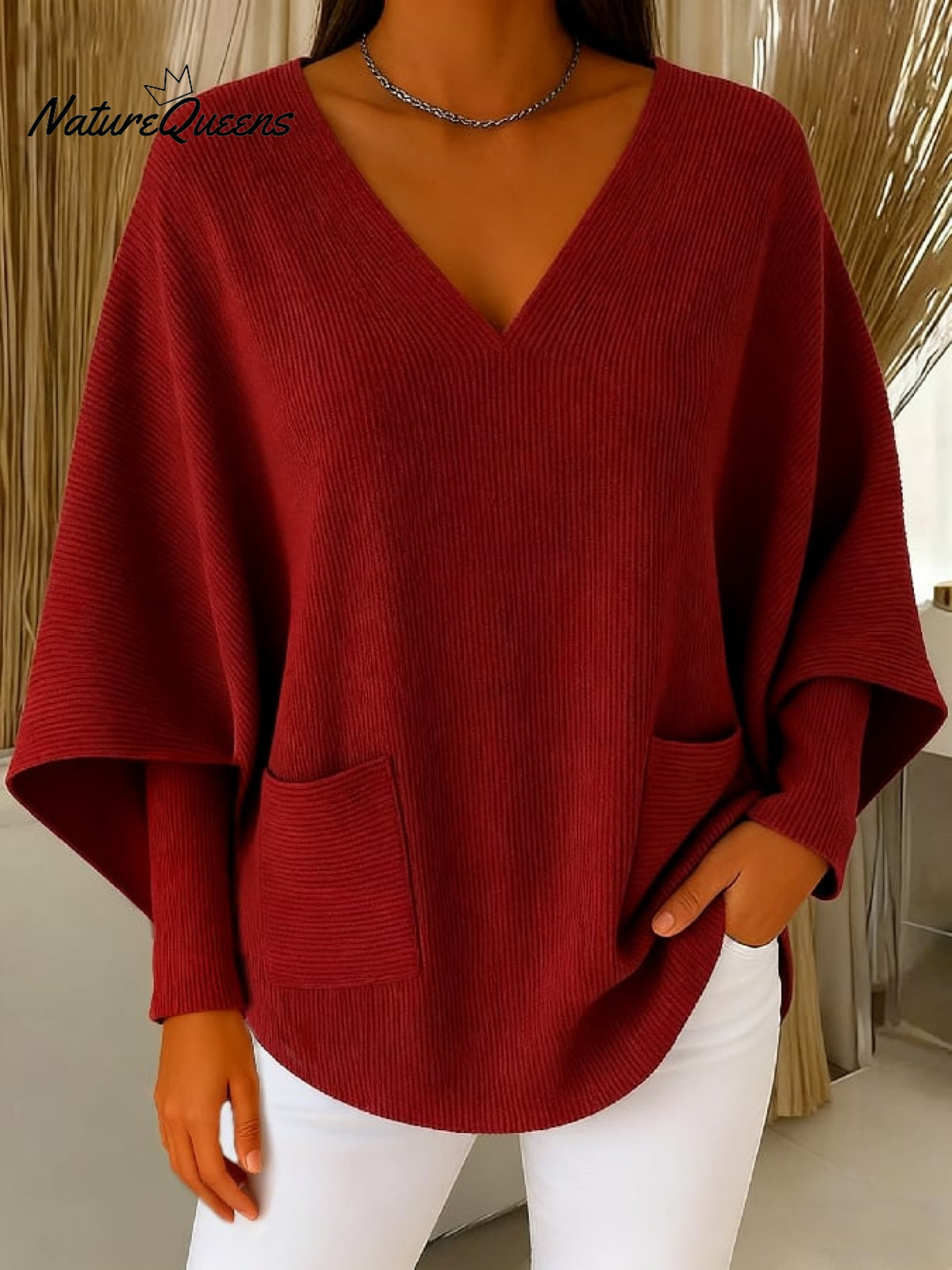 Damski sweter w jednolitym kolorze z dekoltem w serek