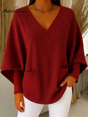 Damski sweter w jednolitym kolorze z dekoltem w serek