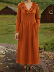 Elegancka sukienka midi z dzianiny w stylu retro z dekoltem w serek i falbankami