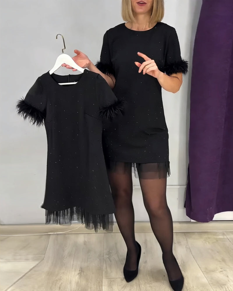 Elegancka damska sukienka z tiulu ze strasami