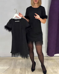 Elegancka damska sukienka z tiulu ze strasami