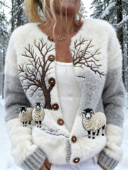 Damski dzianinowy kardigan z owczą sceną śnieżną w lesie
