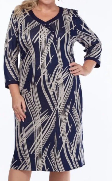 Elegancka damska sukienka z abstrakcyjnym nadrukiem i rękawami 3/4