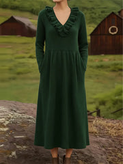 Elegancka sukienka midi z dzianiny w stylu retro z dekoltem w serek i falbankami