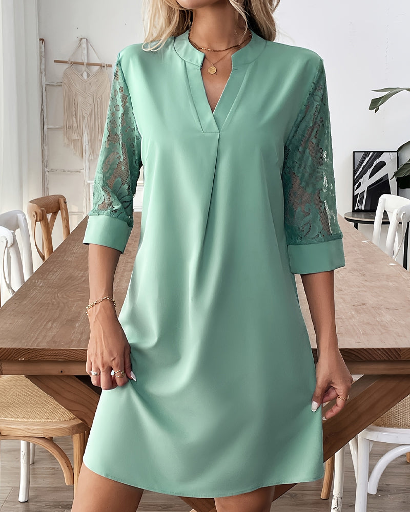 Elegancka koronkowa sukienka z krótkimi rękawami